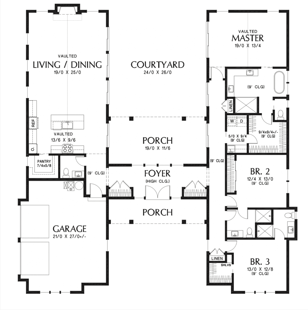 House floor plan with living, dining, bedrooms, and garage.